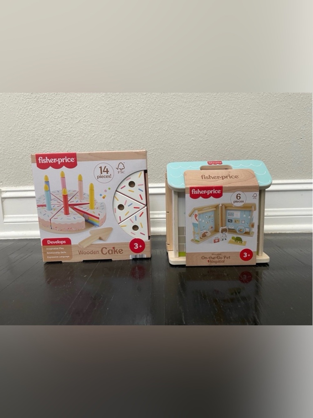 Fisher-Price Wooden On-The-Go Pet
Animal Hospital &
Wooden Cake